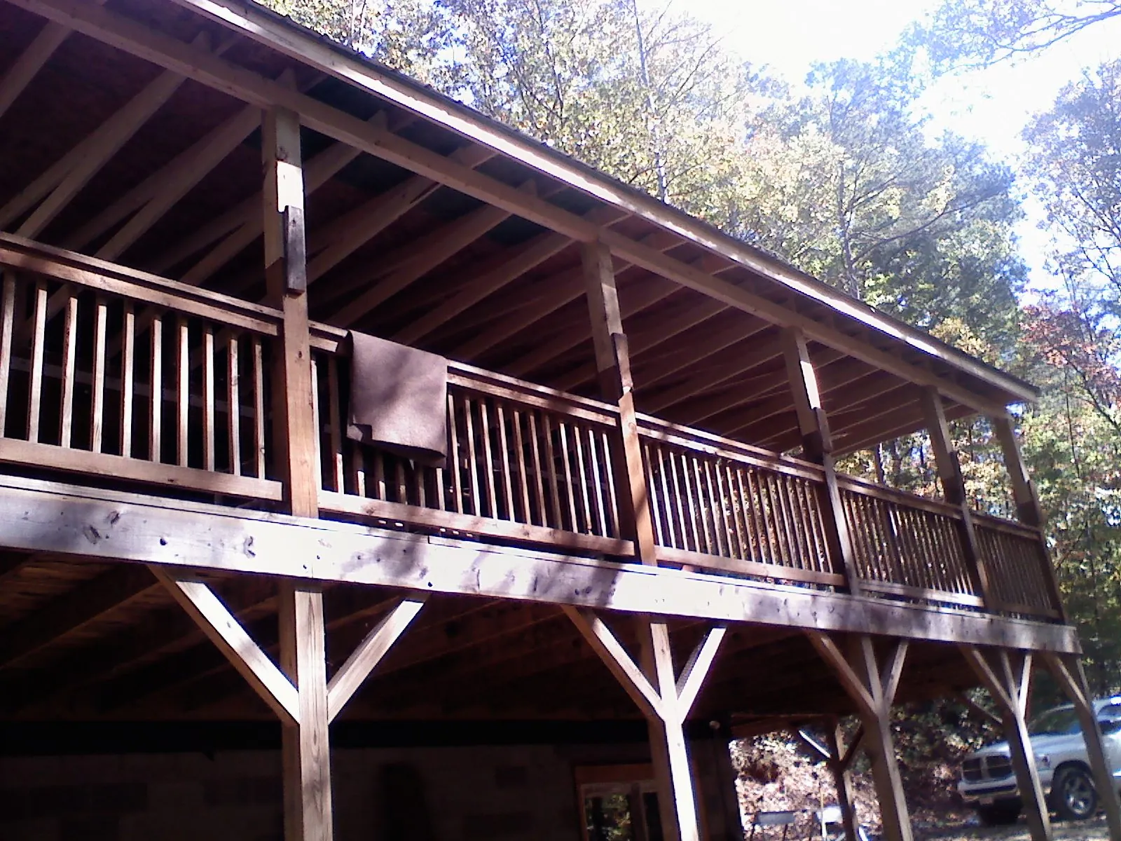 Timber framing under a new elevated porch and deck — Roof Leak Repair in Big Pool by Roofing Brothers